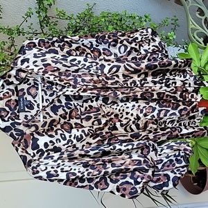 Bebe blouse. Size XS. Brown and black color.